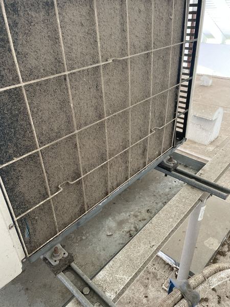Dirty outdoor condenser coil before cleaning